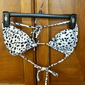 Black and white cow print biking tie top size large
